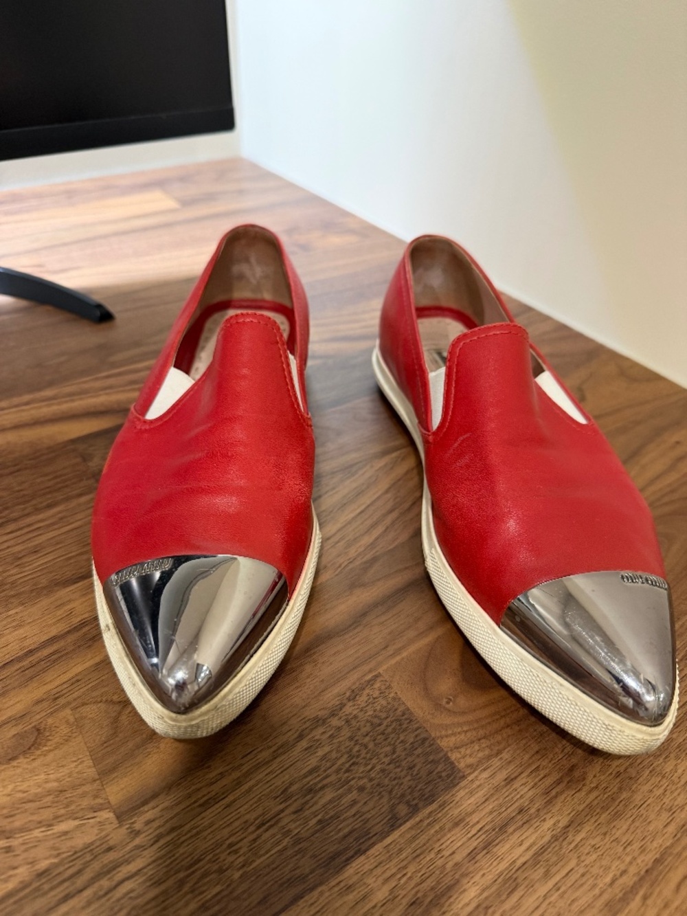 Miu Miu red shoes with metal piece